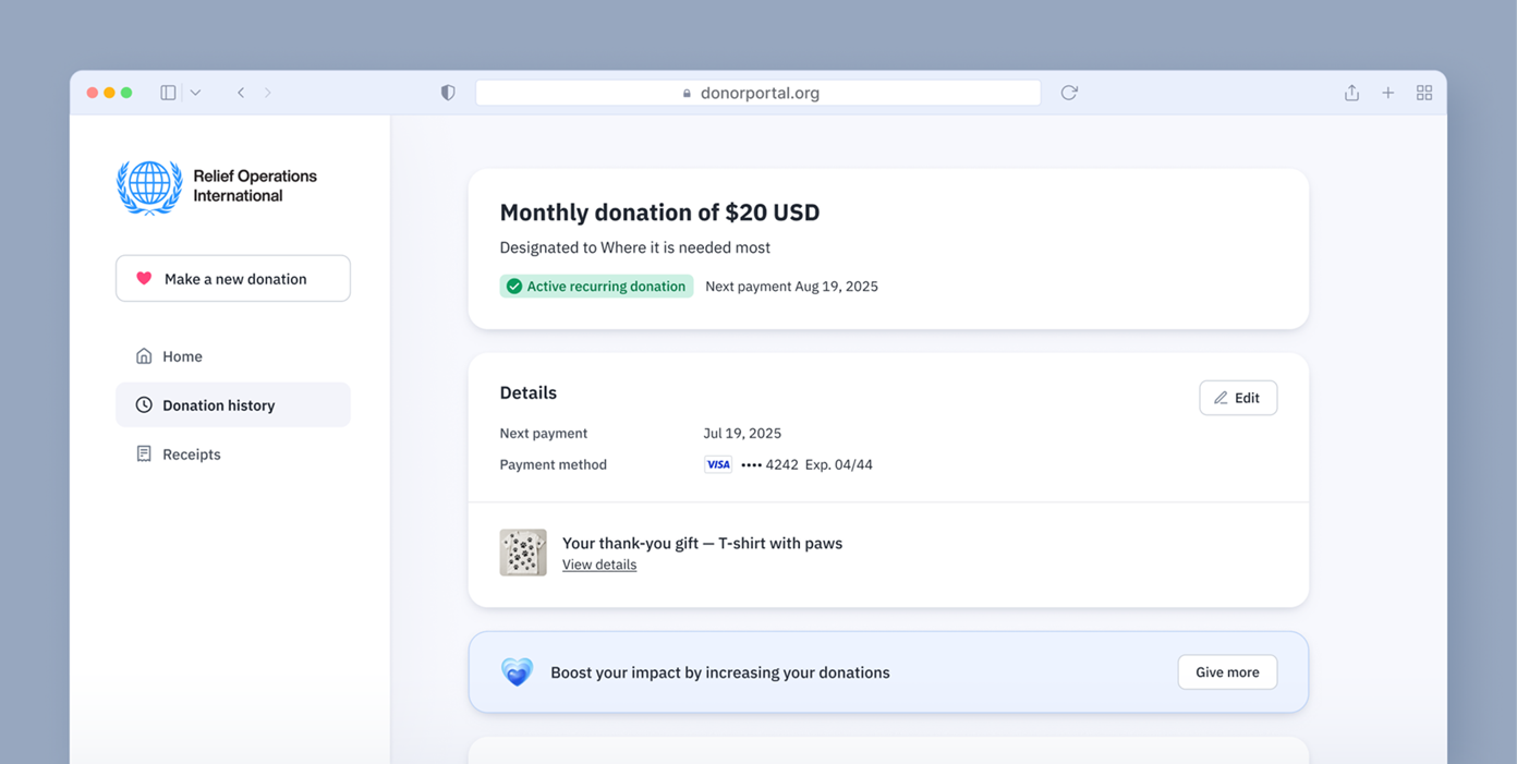 Monthly donation summary for $20 USD, designated for urgent needs. Next payment scheduled for August 19, 2025. Payment method: Visa. Thank-you gift noted as a T-shirt with paws. Option to edit donation details or increase donations.